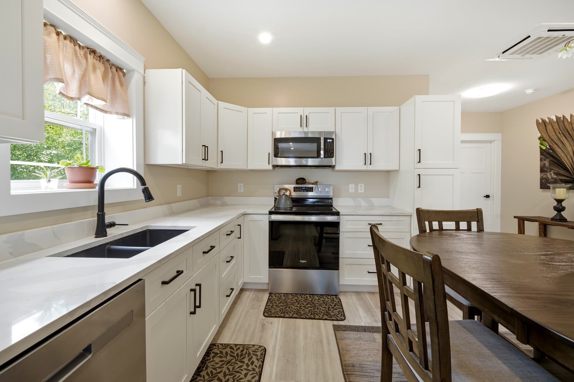 Bright white kitchen with skylight