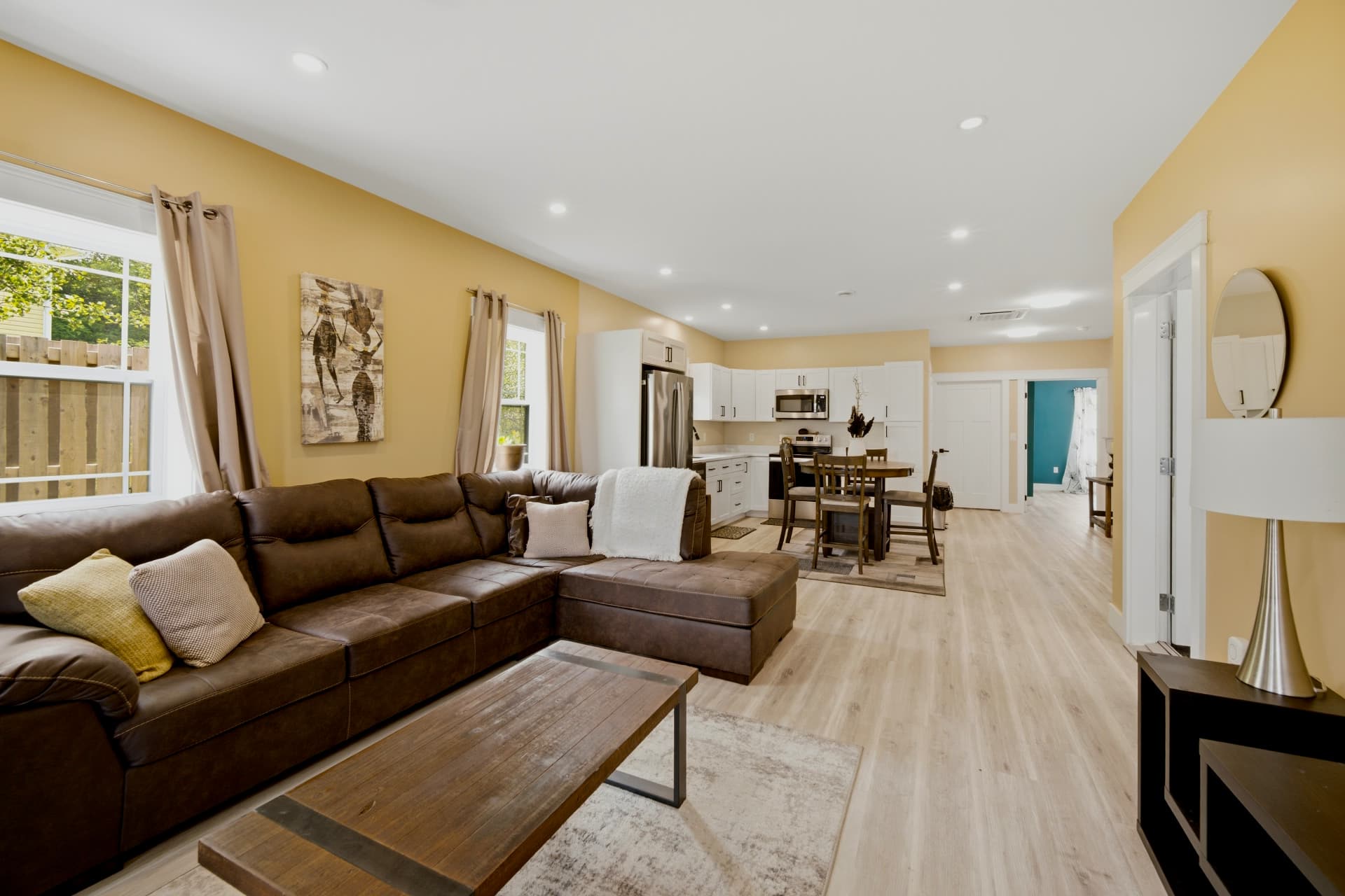 Open-concept living room and kitchen shot in 4K